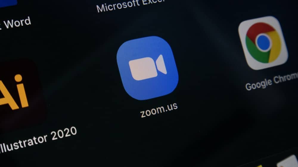 photo of Zoom application icon next to other app icons