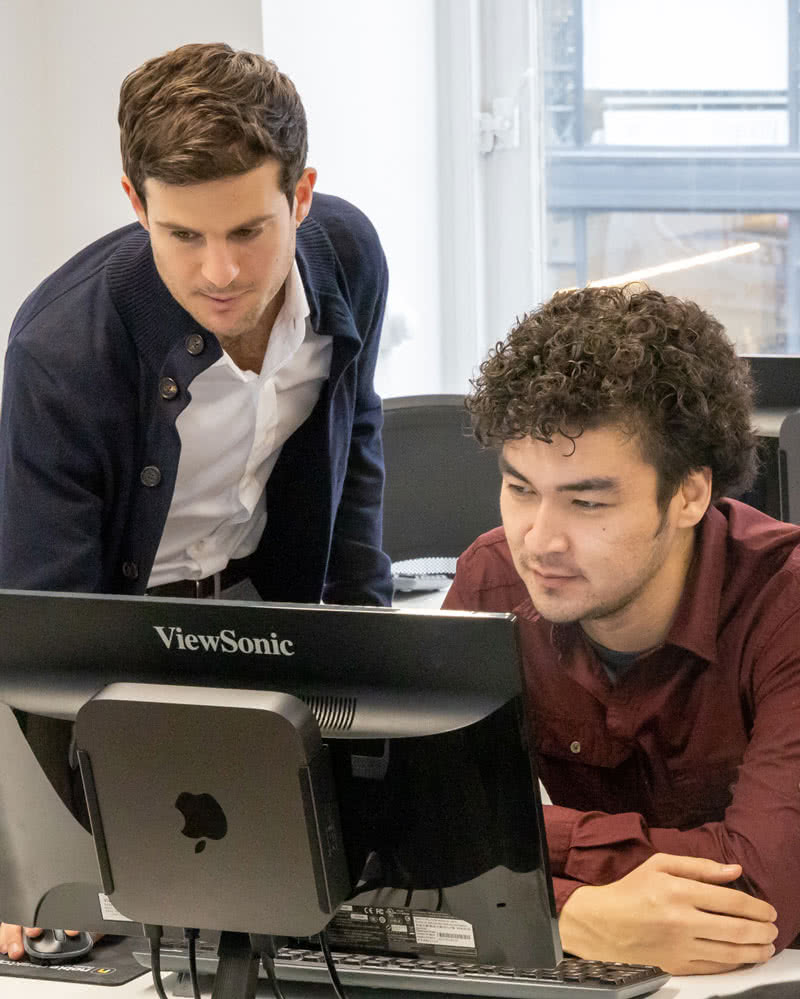 Teacher helping a student 1-on-1